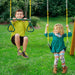 Gorilla Playsets High Point II Swing Set A Kid Holding On Trapeze