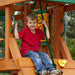 Gorilla Playsets High Point II Swing Set A Kid Stting On A Deck