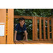 Gorilla Playsets Mountaineer Swing Set A Boy On The Entrance Of The Deck