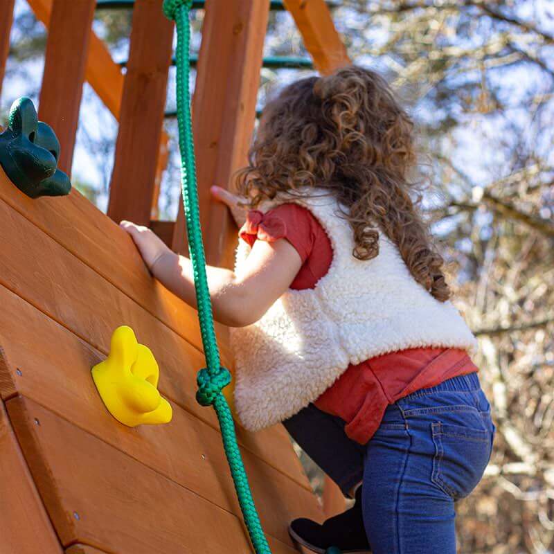 Gorilla Playsets Outing with Monkey Bars Swing Set A Girl Climbing The Rockwall