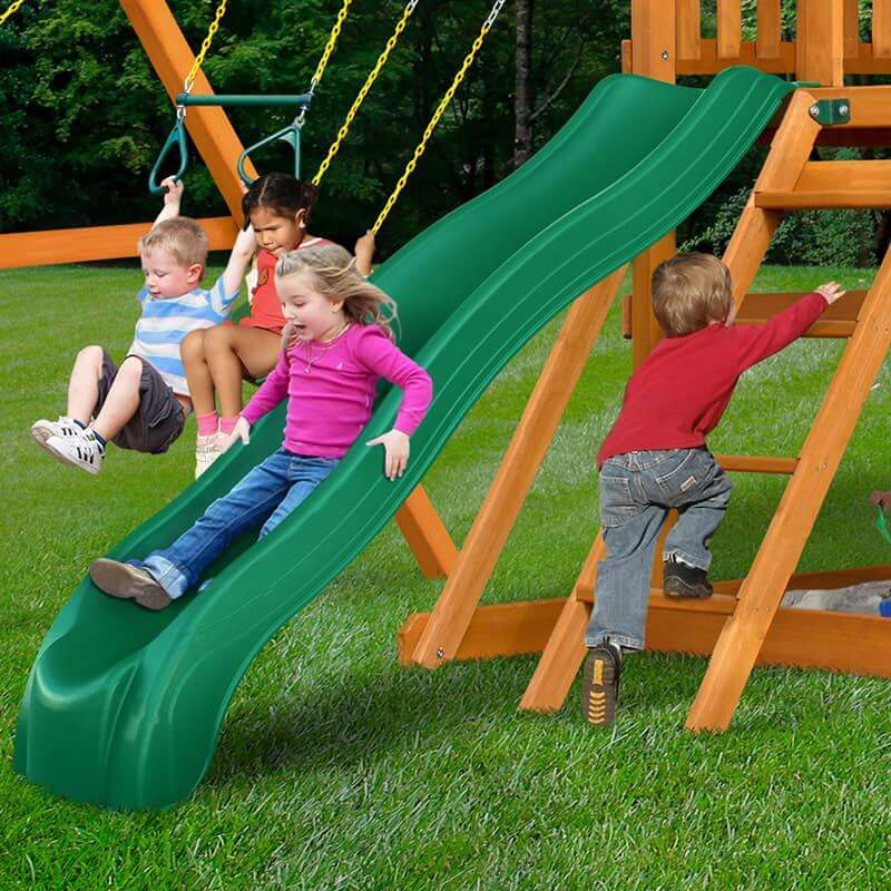 Gorilla Playsets Outing with Monkey Bars Swing Set Side View A Kid Sliding