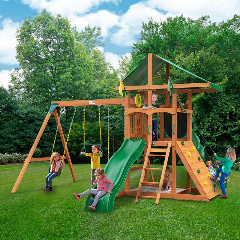 Gorilla Playsets Outing with Tube Slide Deluxe Green Vinyl Canopy Corner View With Kids Outdoor