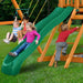 Child sliding on Gorilla Outing with Tube Slide swing set