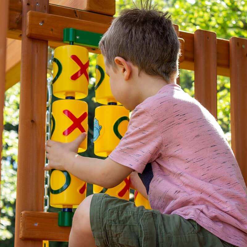 Gorilla Playsets Pioneer Peak Swing Set Boy Playing Tic Tac Toe