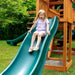 Gorilla Playsets Treasure Trove II Swing Set A kId On Alpine Slide