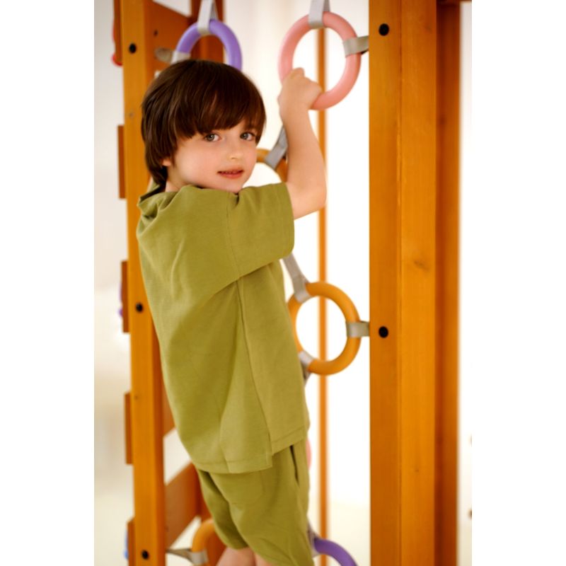 Hawthorn XL | Octagon Outdoor Jungle Gym with a boy on the rings