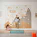 Indoor climbing wall for kids with kids playing