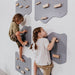 Indoor Rock Climbing Wall for Home With Cloud Shaped Panels Wooden Climbing Holds for Kids 3 10 Tone Gray Set of 3 Side View Kids
