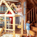 Indoor Wooden Playhouse with Triangle ladder, Slide Board and Swings with girls playing