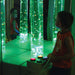 Interactive Bubble Tube Illuminated in Green