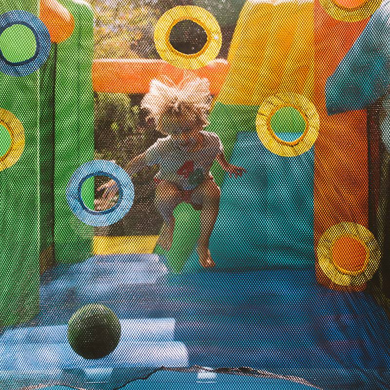 kid-jumping-inside-the-kid-wise-double-shot-bounce-house