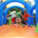 kid-wise-arc-arena-ii-sport-bounce-house-3-kids-playing-and-kicking-the-ball