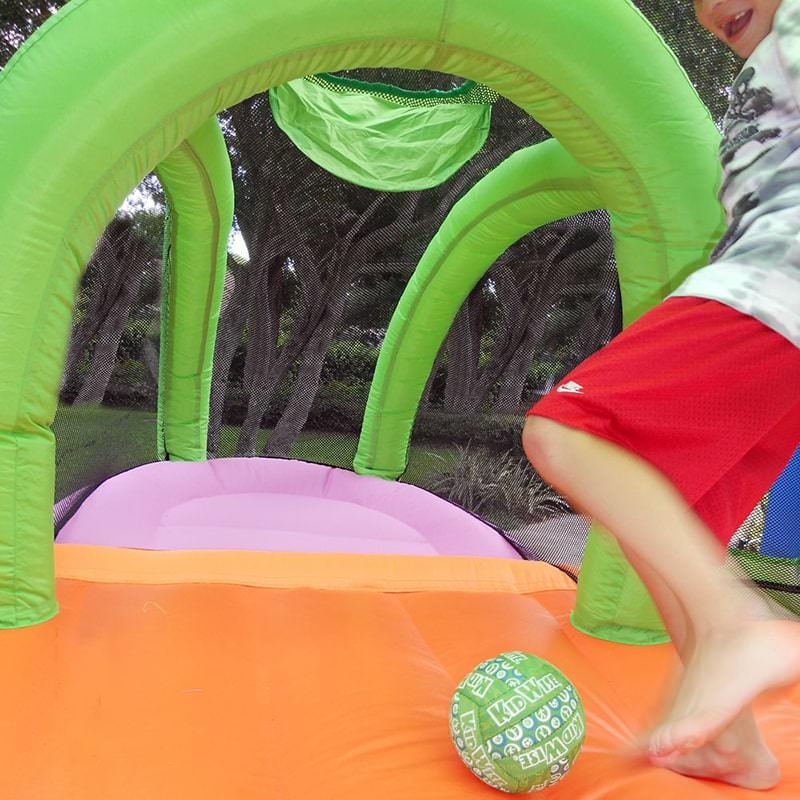 kid-wise-arc-arena-ii-sport-bounce-house-kid-kicking-the-ball