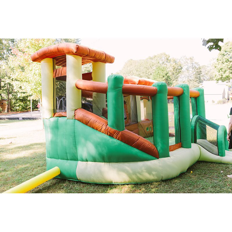 kid-wise-clubhouse-climber-bounce-house-rear-view-lifestyle-backyard