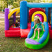 kid-wise-lucky-rainbow-bounce-house-kin-in-green-dress-sliding
