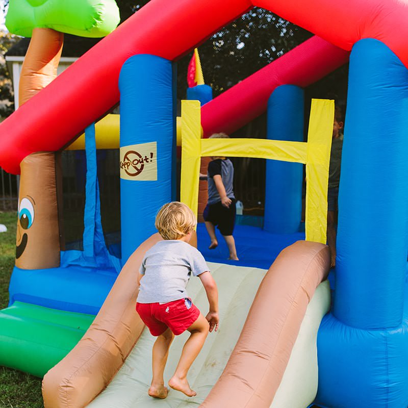 kid-wise-my-little-playhouse-bounce-house-kid-climbing-on-the-slide