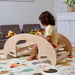 Kidodido 2 In1 Montessori Wooden Seesaw and Table Chair Set A Kid Sitting Organizing His toys