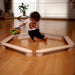 Kidodido Balance Beam and Stepping Stones Set A Kid Playing Inside The Hexagon Balance Beam