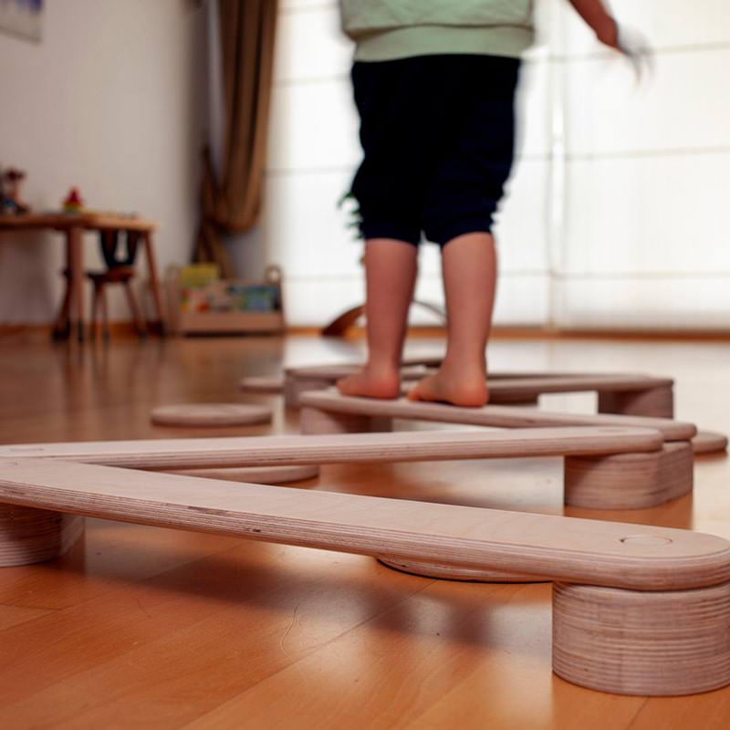 Kidodido Balance Beam and Stepping Stones Set Side View Up Close With A KId Standing