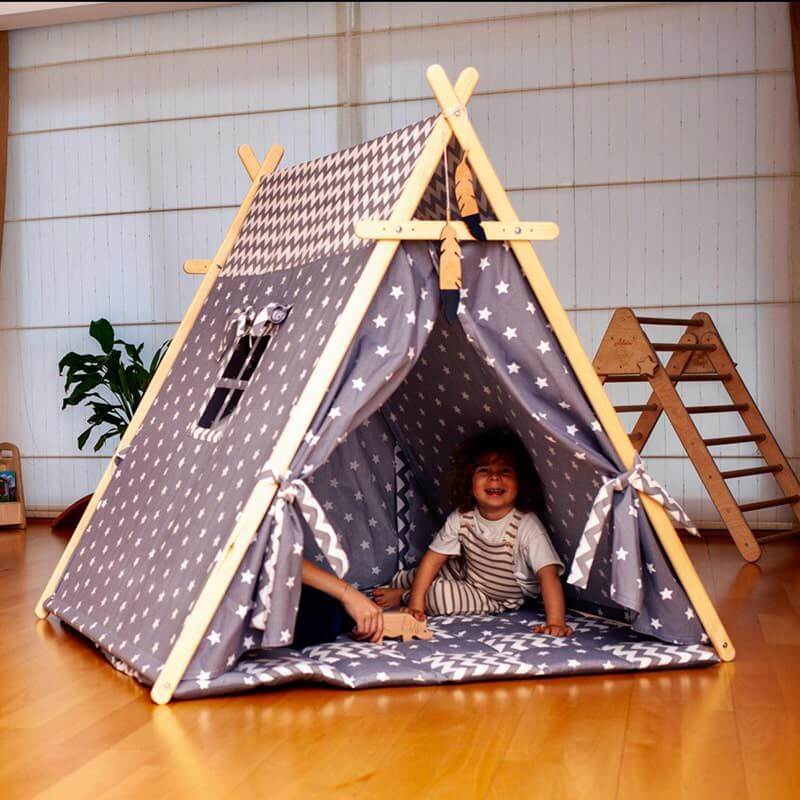 Kidodido Gray Stars Play Tent and Play Mat Front View Showing A Kid Smiling Inside The Tent