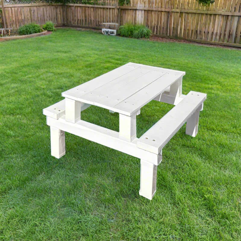 White Poly kids picnic table in a yard