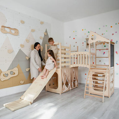 Children playing on Natural Wood indoor climber, side view