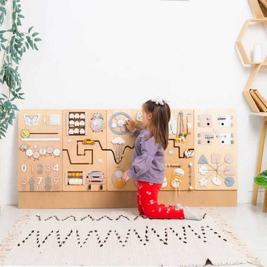BumblebeeSmart learning wall panel montessori busy board with a girl playing 