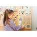 BumbleBeeSmart Learning Wall Panel up close with girl