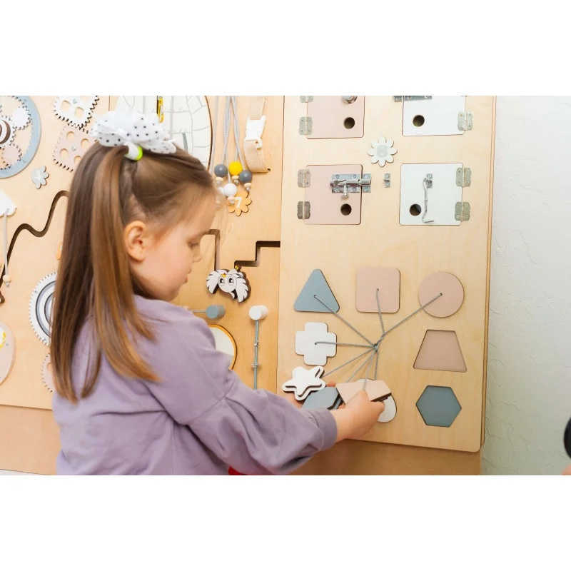 BumbleBeeSmart Learning Wall Panel up close with girl