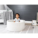 little-big-playroom-ball-pit-boho-triangle-ball-pit-67-water-67-pearl-and-66-stone-balls-front-view-with-kid-playing-inside-the-ball-pit