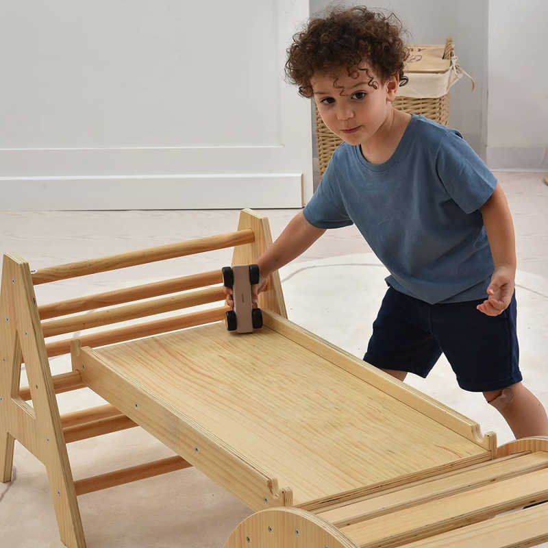 Maple Beginner Pikler Triangle and Rocker with a boy