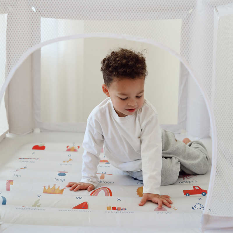 Mini Alphabet Indoor Bounce House with boy inside