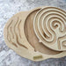 Front view of the Mira Balance Board and interchangeable maze