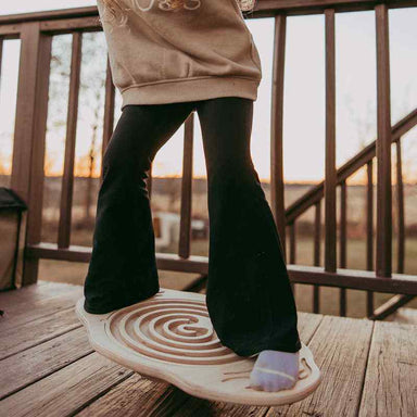 Mira Balance Board with interchangeable maze on an outdoor deck