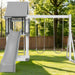 Swing Kingdom Mod 44 Grey and White Vinyl Swing set in a yard