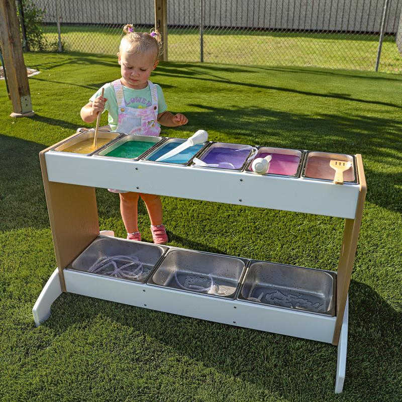 outdoor potion station with girl playing 
