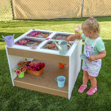 outdoor sensory table with easy clean out trays with lower storage shelf