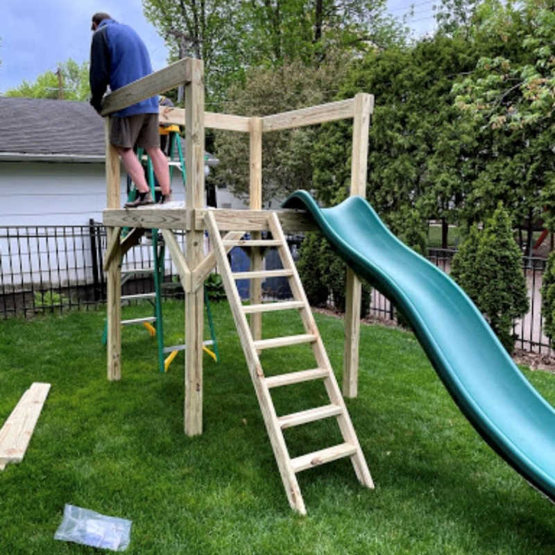 Pathfinder Swing Set: Space Saver Edition being installed