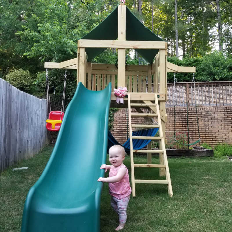 Pathfinder Swing Set: Space Saver Edition with a little girl