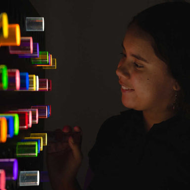 Pixel pop interactive light panel up close with a girl
