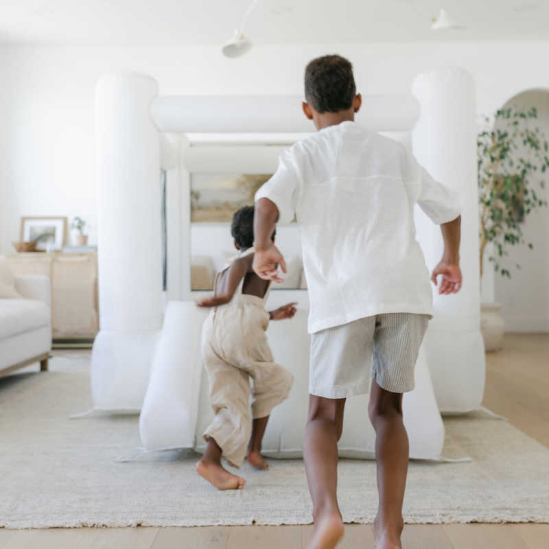 Smol Tumble Bounce house inside with kids