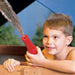 Boy playing with the playstar water slide kit water cannon