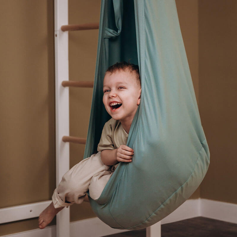 Pod Swing Warm Forest Green Boy Playing