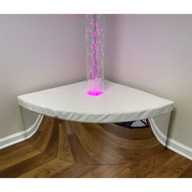 Quadrant tube podium in a corner with a bubble tube