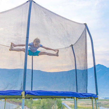 Skywalker Trampolines 12' Round Trampoline with kid jumping 