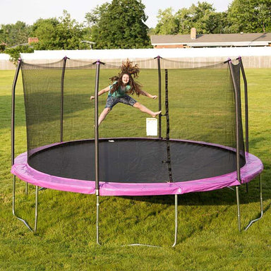 Skywalker Trampolines Purple 15' Round Trampoline Showing A Kid Outdoor Jumping