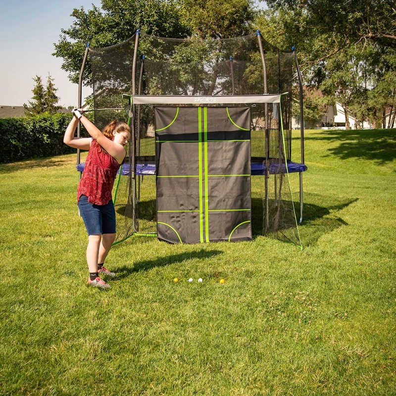 Skywalker Trampolines Sports Multi Sport Training Net Game Accessory with girl playing golf