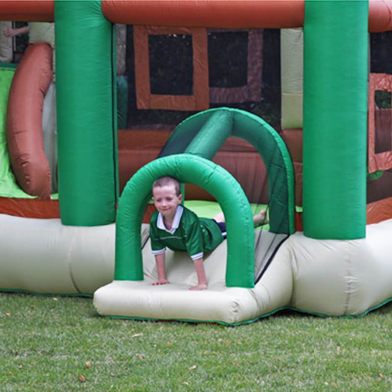 sliding-on-a-small-slide-on-kid-wise-clubhouse-climber-bounce-house