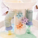 Close view of the Smol Curiosity Water Table sensory play accessories and activity area
