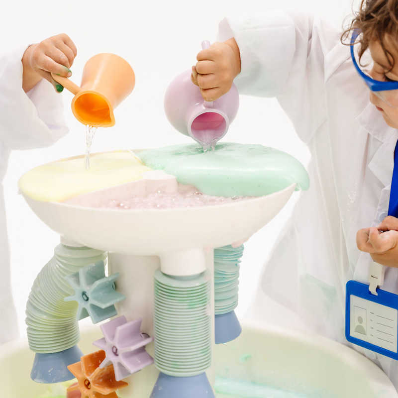 Close view of the Smol Curiosity Water Table water wheels and interactive play features